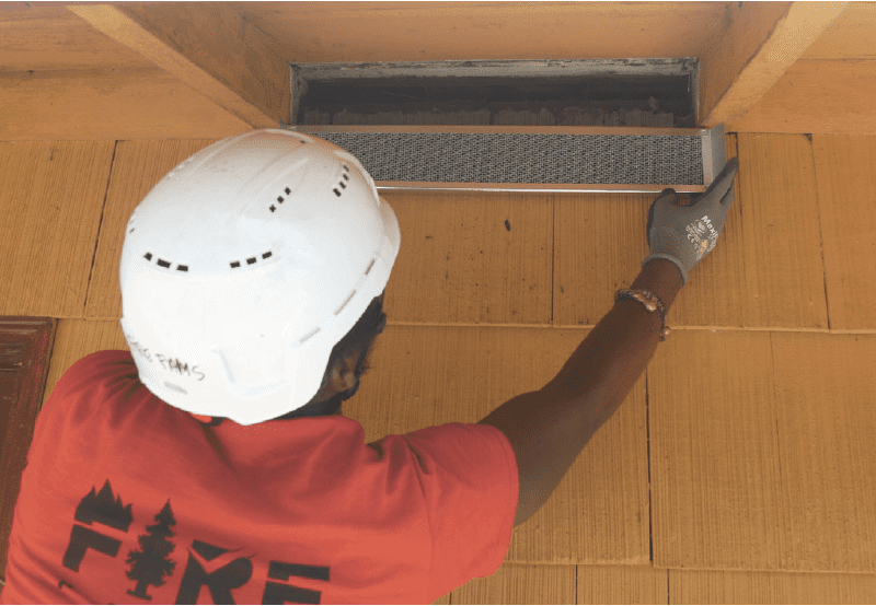 man installing vents